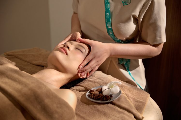 Guest enjoying the Sunburn Relax treatment to soothe and hydrate sun-exposed skin at Serene Spa Phu Quoc.